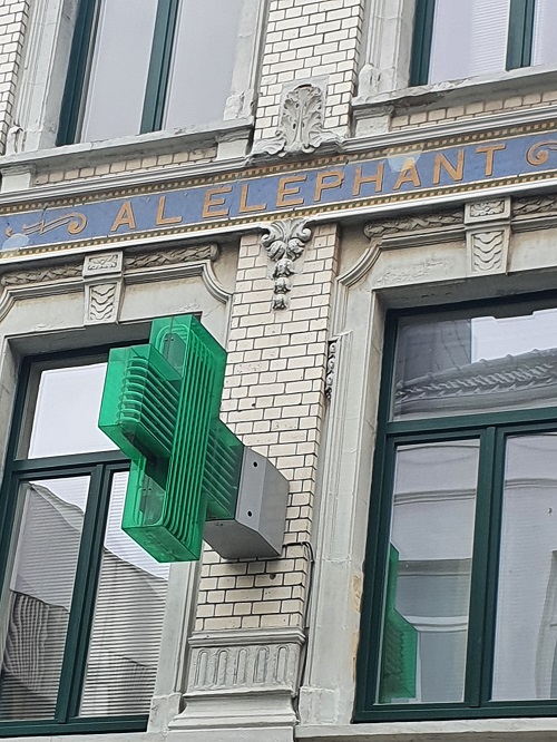 The front of Apotheek De Olifant on the Kerkstraat in Ostend, with its green pharmacy cross
