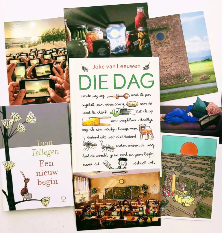 Flat lay of Dutch children's and picture books with a spread of illustrated postcards around them