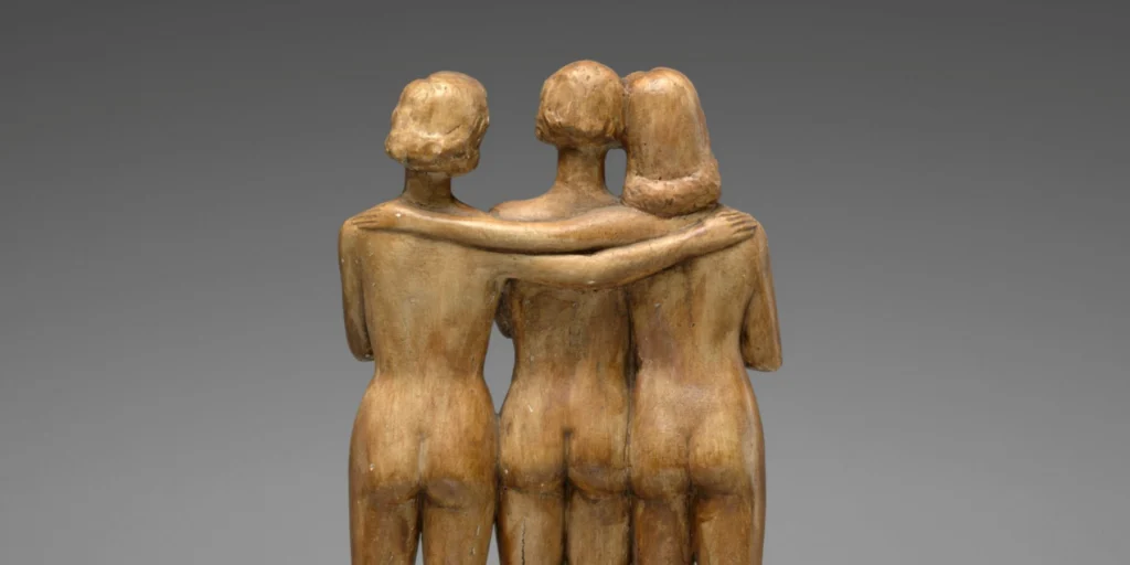 Constant Permeke's wooden statuette The Three Graces, three nude women seen from behind with arms around each other